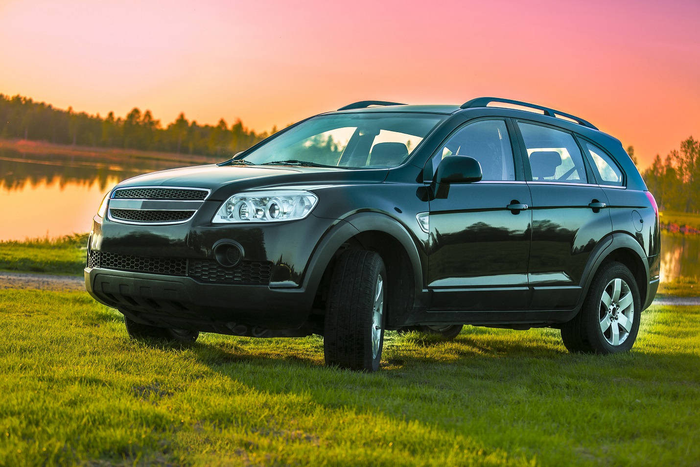 SUV – Black car with sunset background